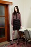 Peggy Shirt - Orange. Dulcie Skirt - Black.